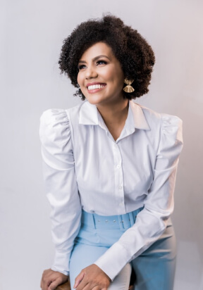 Emma Collins, Affiliate Product Analyst, smiling while working on digital product insights and affiliate performance analysis